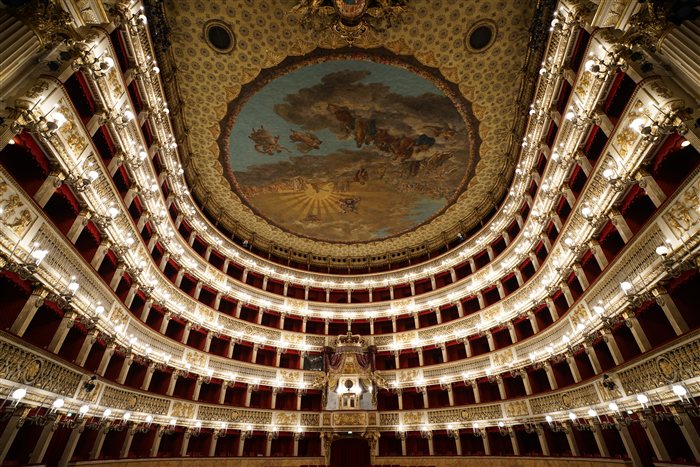 The gilded, tiered interior of the Teatro San Carlo in Naples, the world's oldest continuously active opera house