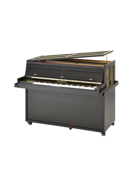 A celesta, which looks like a small upright piano in a black wooden case