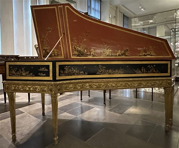 An ornately decorated 1786 harpsichord, Victoria and Albert Museum