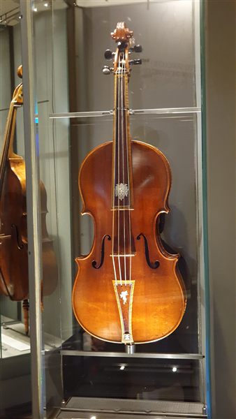 An antique tenor viola on museum display